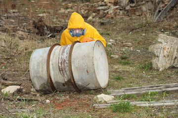 Man with protective  mask and protective clothes explores danger