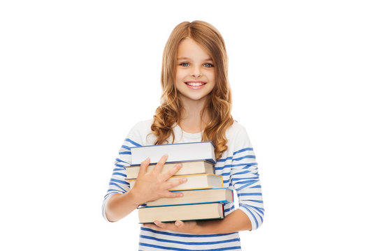little student girl with many books
