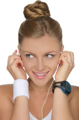 woman with headphones and clock on hand