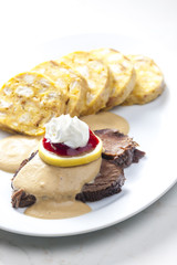 sirloin on cream with dumplings
