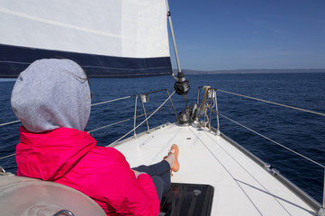 girl relaxing on yacht