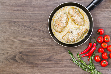 Chicken breast in cream sauce.