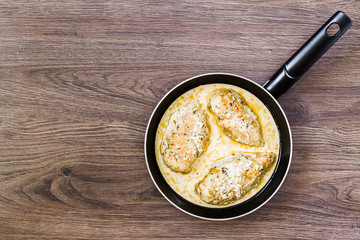 Chicken breast in cream sauce.