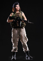 Fototapeta premium Beautiful army girl with gun