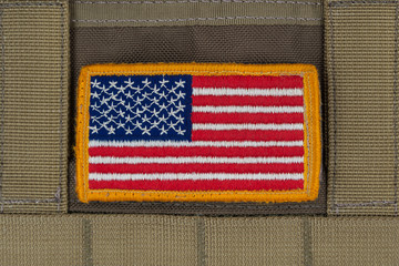 Rounded American flag patch on U.S. military  combat uniform.