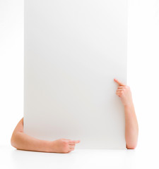 hands of a little girl holding  poster 