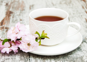Cup of tea and sakura blossom