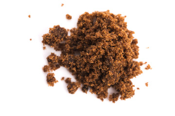 brown muscovado sugar isolated on a white background