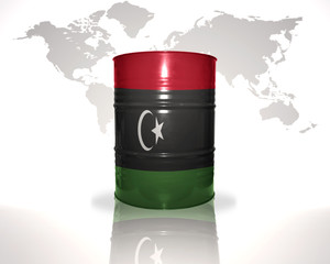 barrel with libyan flag on the world map background