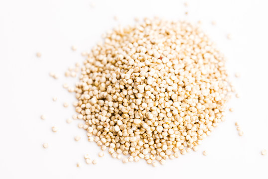 Pile of quinoa grain on a white background