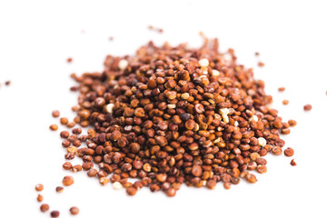 Pile of quinoa grain on a white background