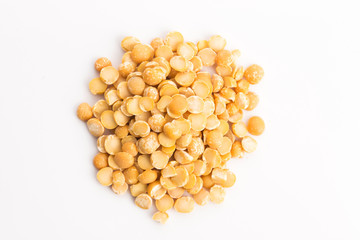 Yellow split peas isolated on white background