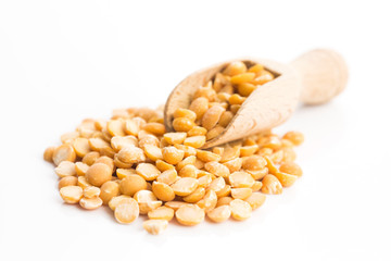 Yellow split peas isolated on white background