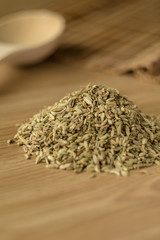Spice fennel on a wooden table.