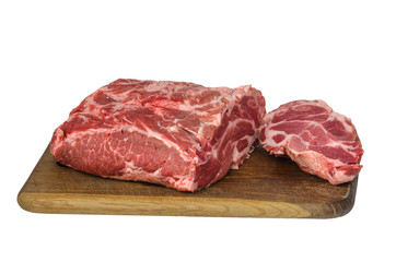 Raw meat on cutting board isolated on white