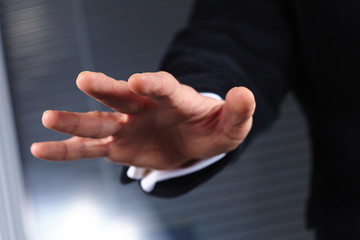 Businessman extending hand to shake