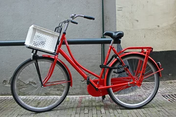 Fotobehang Oranje fiets © EvaWijman