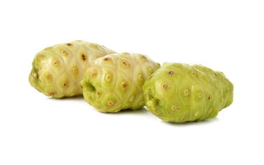 fresh noni fruit on white background