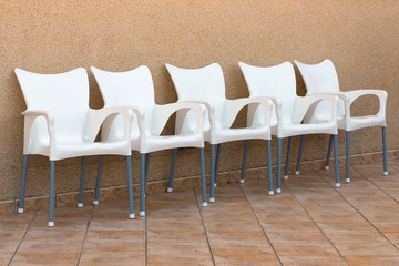 plastic chairs set in a row