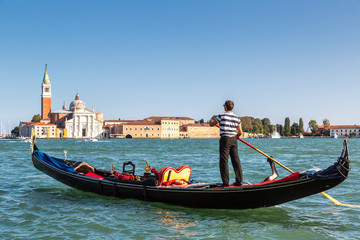 Fototapeta na wymiar Gondola on Canal Grande in Venice