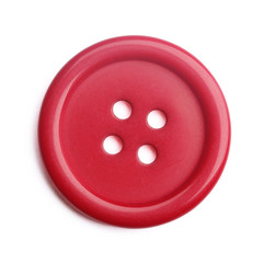 Plastic cloth button closeup on white background