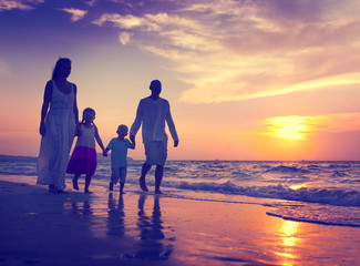 Fototapeta na wymiar Family Walking Beach Sunset Travel Holiday Concept