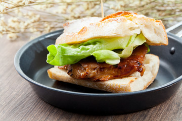 Homemade baquette sandwich with pork