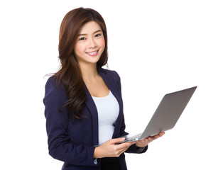 Businesswoman use of laptop computer