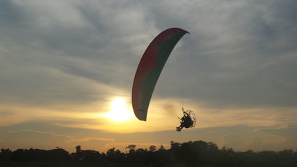 Flying to the sun silhouette