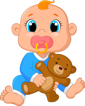 Baby holding a teddy bear