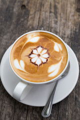 art latte coffee on white cup