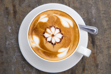 art latte coffee on white cup