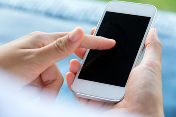 Close up image of Teenage girl text messaging on her phone