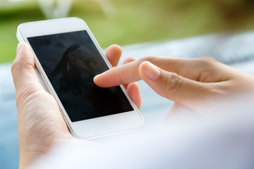 Teenage girl text messaging on her phone