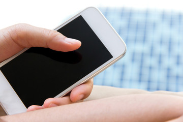 Woman hand holding a Smart Phone