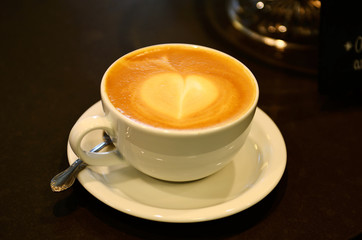 Freshly made espresso coffee made to order in a white cup