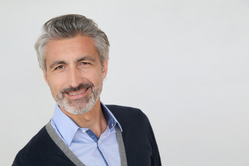 Smiling handsome man with grey hair, isolated