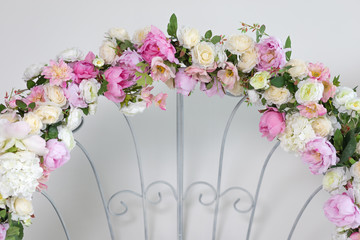 Part of wedding arch with pink and white flowers