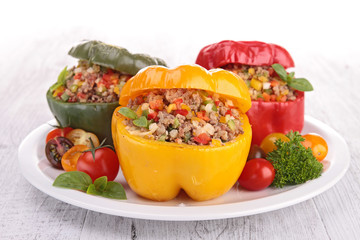 baked bell peppers stuffed with vegetable and meat