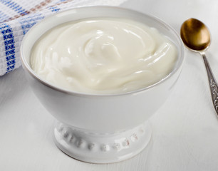Greek yogurt in  white bowl