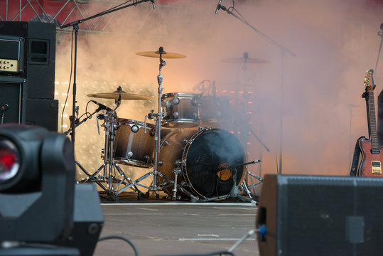 Drums musical tool on the stage in the smoke