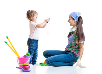mother with kid cleaning room and having fun