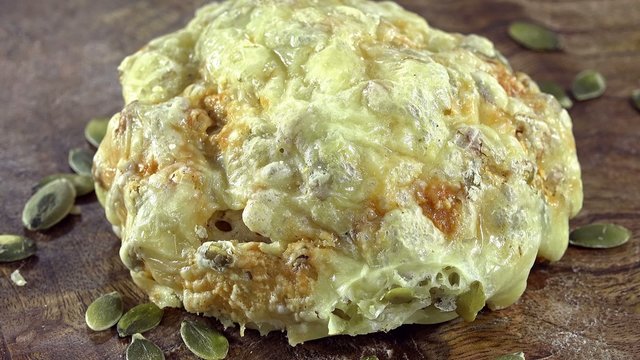 Rotating Cheese Rolls (seamless loopable 4K UHD footage)