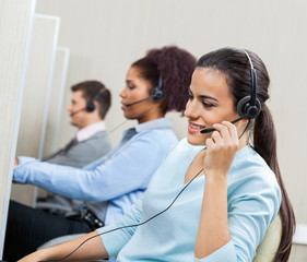 Female Customer Service Representative Talking On Headset