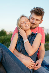 pretty couple embrace outdoor.