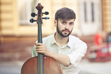guy who plays the cello at  street in summer © mrcats