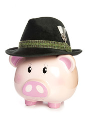 piggy bank wearing bavarian beer hat
