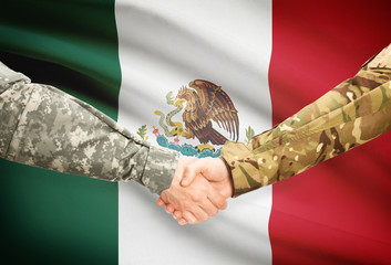 Men in uniform shaking hands with flag on background - Mexico