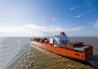 Large container cargo ship in the open sea