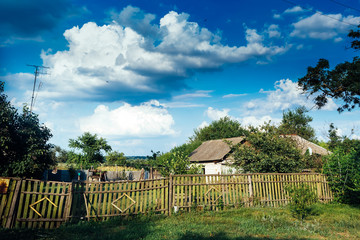Fototapeta na wymiar summer country landscape fence barn
